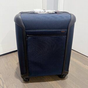 TUMI Continental Expandable Softside Spinner 4-Wheeled Carry-On, Blue/ Black